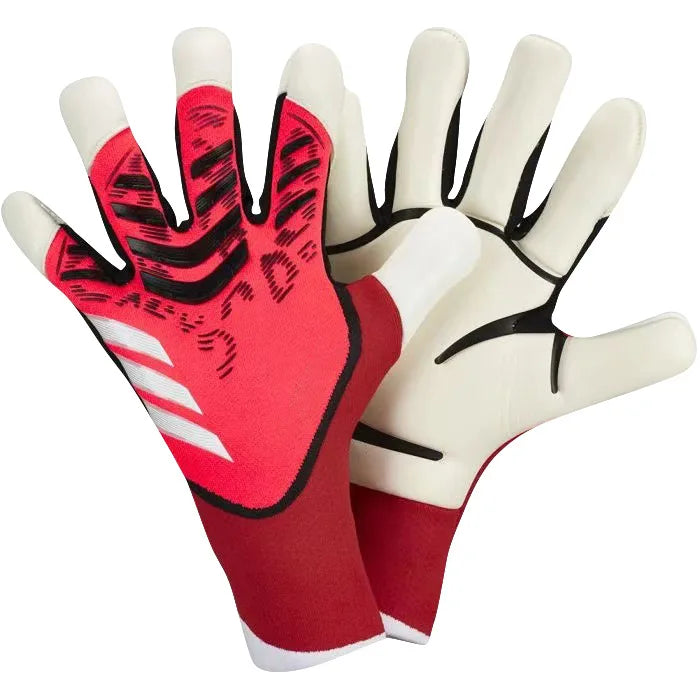 A pair of red and white latex goalkeeper football gloves shown from above.