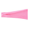 Un bandeau élastique rose plié et présenté sur un fond blanc.