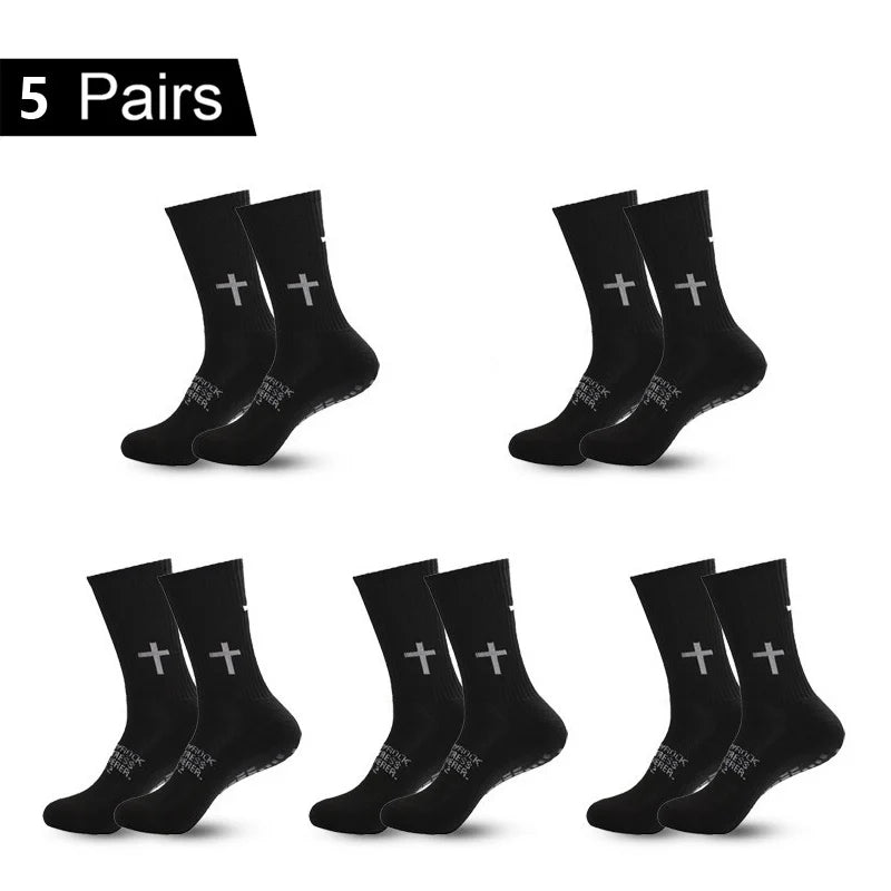 Five pairs of black performance athletic socks for sports and fitness