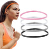 A set of four non-slip elastic sport headbands in pink, white, gray, and black are displayed next to a woman wearing an orang