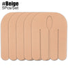 A set of five beige kinesiology tapes for sports recovery.