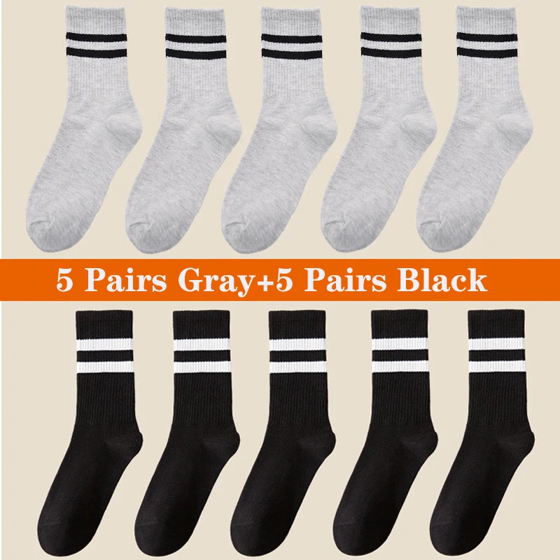 A collection of ten pairs of breathable cotton sport socks in gray and black colors.
