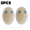Two clear silicone blister patches with blue arrows on the surface for foot protection