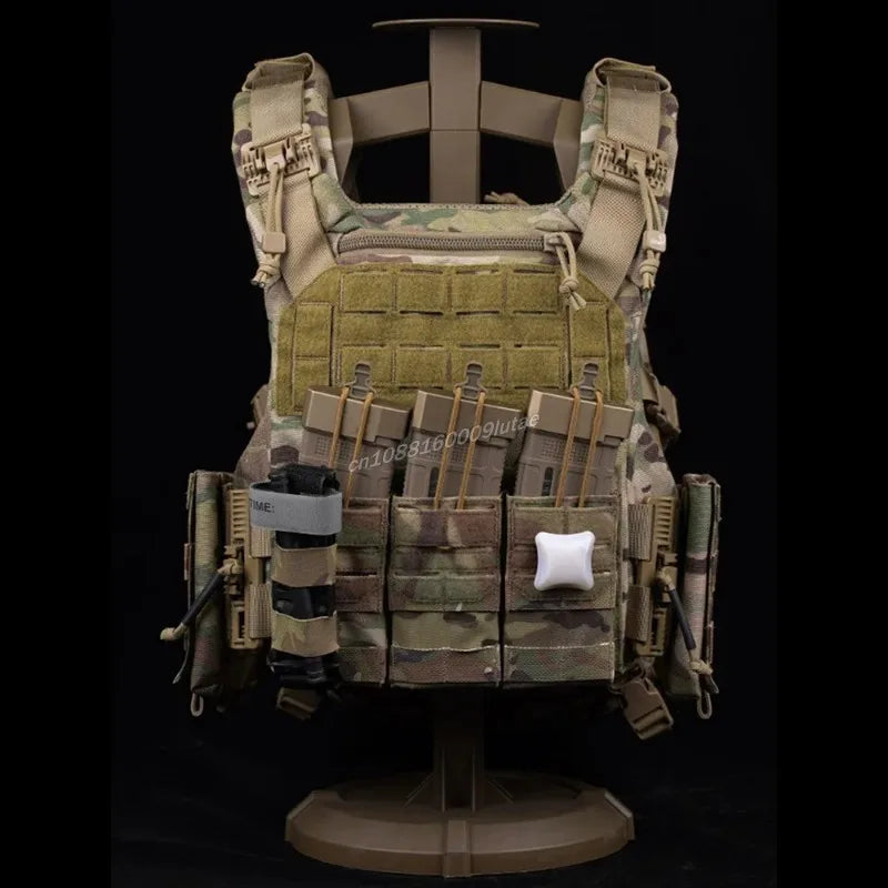 A tactical magazine pouch designed for plate carriers, shown in a military camouflage pattern.