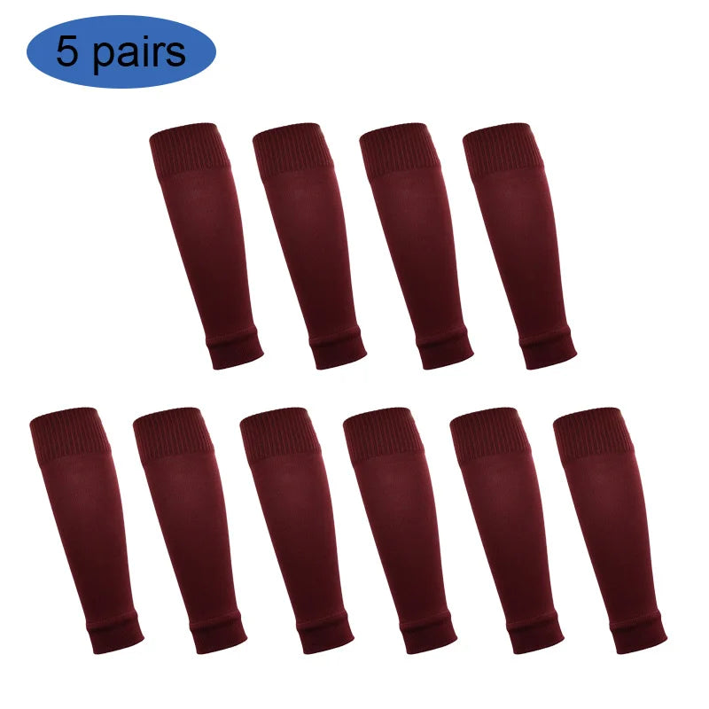 Five pairs of maroon football shin guards for leg protection