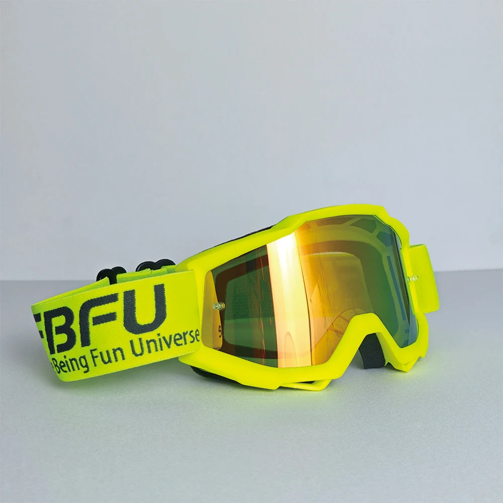 Yellow sport-grade skiing goggles with orange tinted lenses and black branding