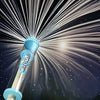A water gun is firing a bright stream of water, creating a starburst effect against a dark background.