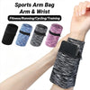 A hand is wearing a black zippered wrist bag for phone and key card, shown alongside various colored sports arm bags.