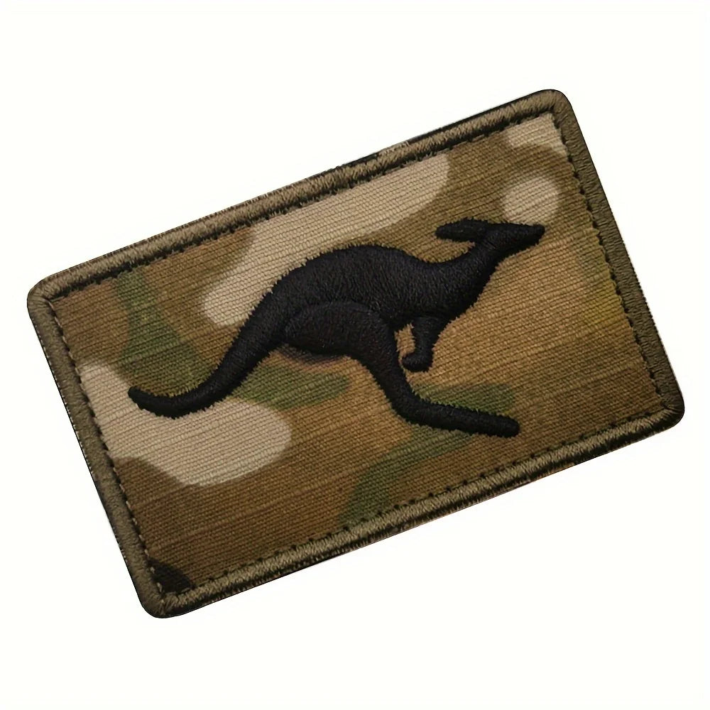 An embroidered tactical patch featuring a silhouette of a kangaroo in camouflage colors.