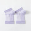 A pair of light purple therapeutic compression socks for foot and ankle pain relief.