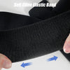Black soft cline elastic band being held and stretched to show its flexibility