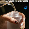A hand pours water into a clear silicone hydration flask, demonstrating a convenient water filling port.