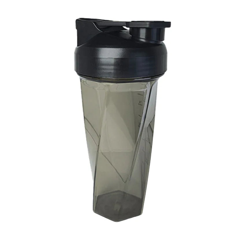 A clear plastic protein shaker bottle with a black cap and a tapered design.