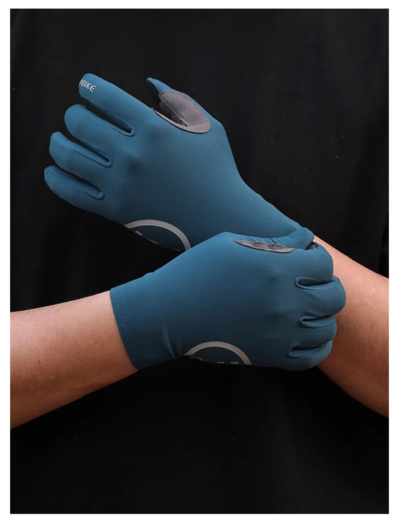 A close-up of a hand wearing dark teal cycling gloves with silicone palm pads against a black background.