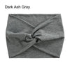 A dark ash gray fabric headband is tightly cross-knotted and displayed flat.