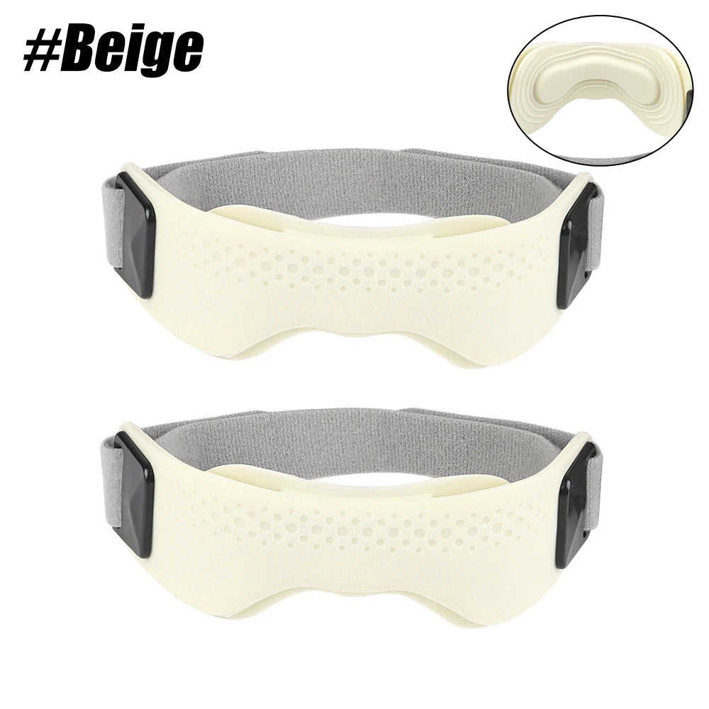 A beige and gray anatomical knee patella support strap worn around the knee.