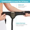 A person is holding a black inguinal hernia support belt with a mesh pad, demonstrating its non-slip design and fixed positio