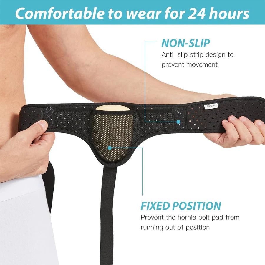A person is holding a black inguinal hernia support belt with a mesh pad, demonstrating its non-slip design and fixed positio