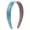 A curved satin hair band shown in light blue and brown colors.