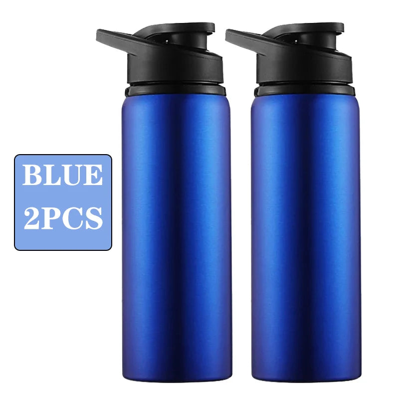 Two blue leakproof portable aluminum water bottles with black caps
