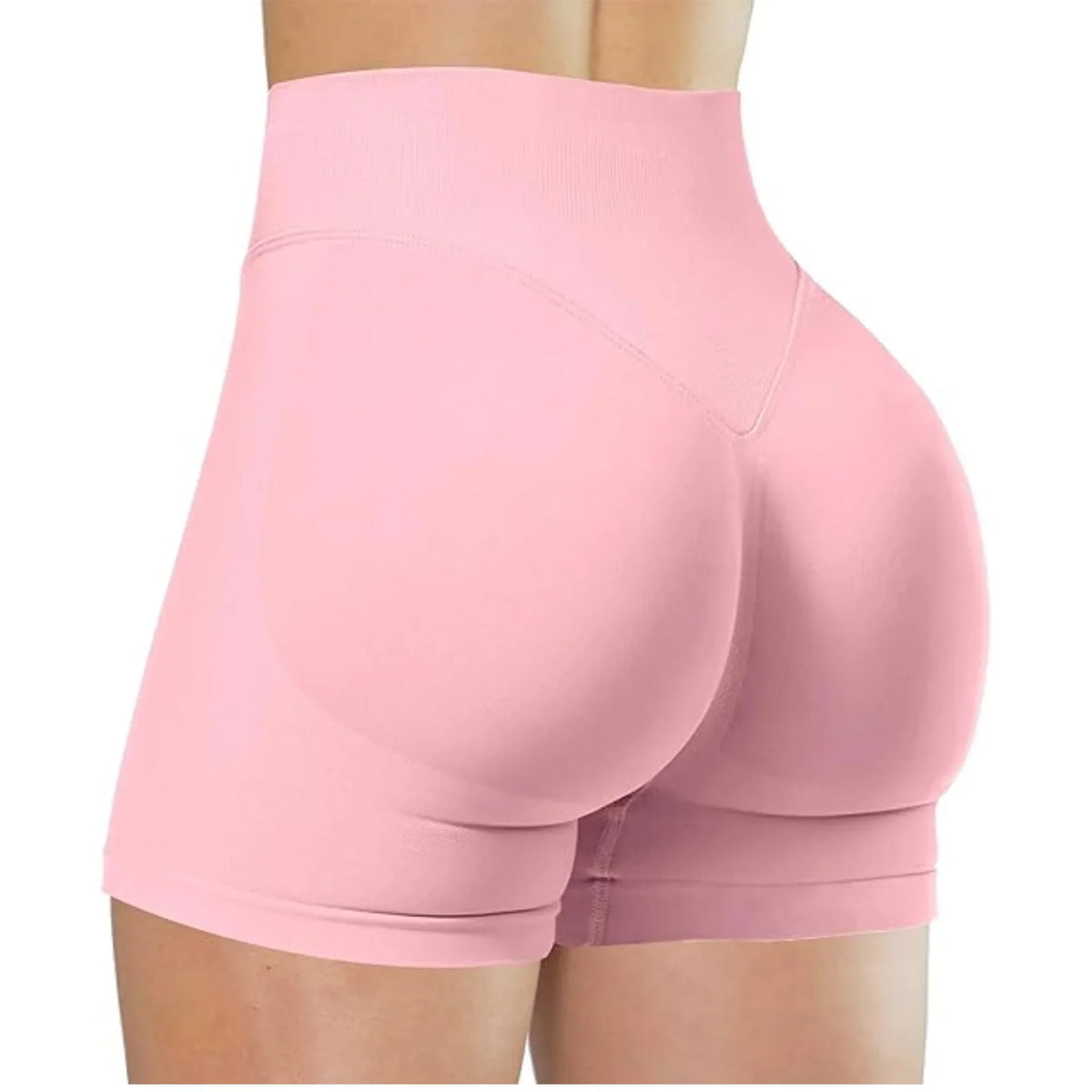 Light pink high-waisted yoga shorts worn by a person.