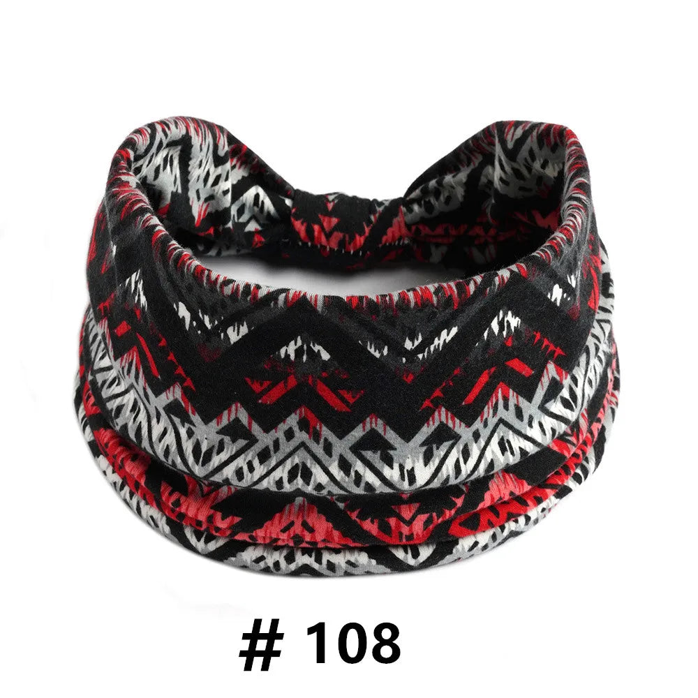 A black and red patterned boho cotton turban headband for workout or yoga.