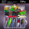 A clear plastic box containing 73 fishing lures including soft baits, spoons, and crankbaits.