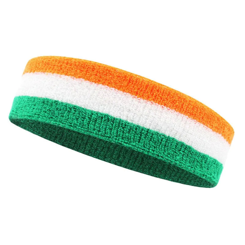 A knitted athletic headband featuring horizontal stripes of orange, white, and green.