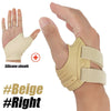 Beige Silikon-Manschette zur Stabilisierung der Daumenfuge, getragen an der Hand.