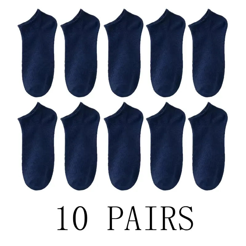 Ten pairs of navy blue comfort fit ankle socks laid out in a row.
