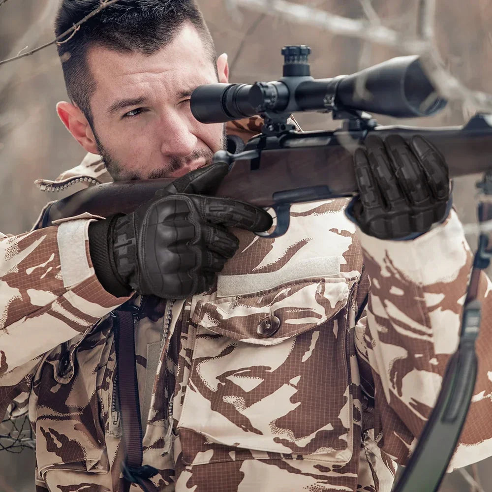 A man wearing tactical PU leather touch screen gloves and a camouflage jacket is aiming a rifle.