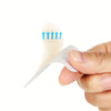 A hand holds an invisible silicone blister patch with blue arrows indicating pressure points on the skin.