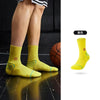Yellow performance basketball running socks shown on a person's leg and isolated for detail.