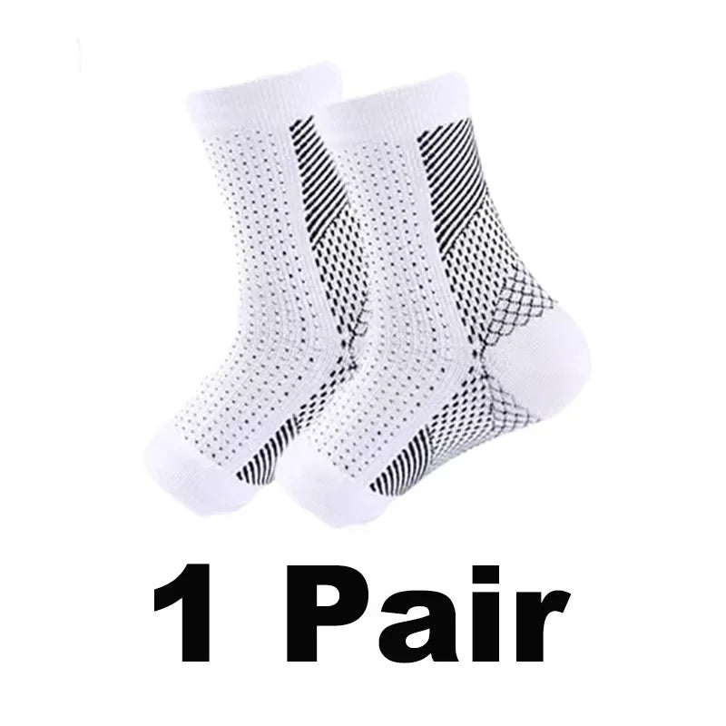 A pair of white compression ankle support braces with black mesh detailing.
