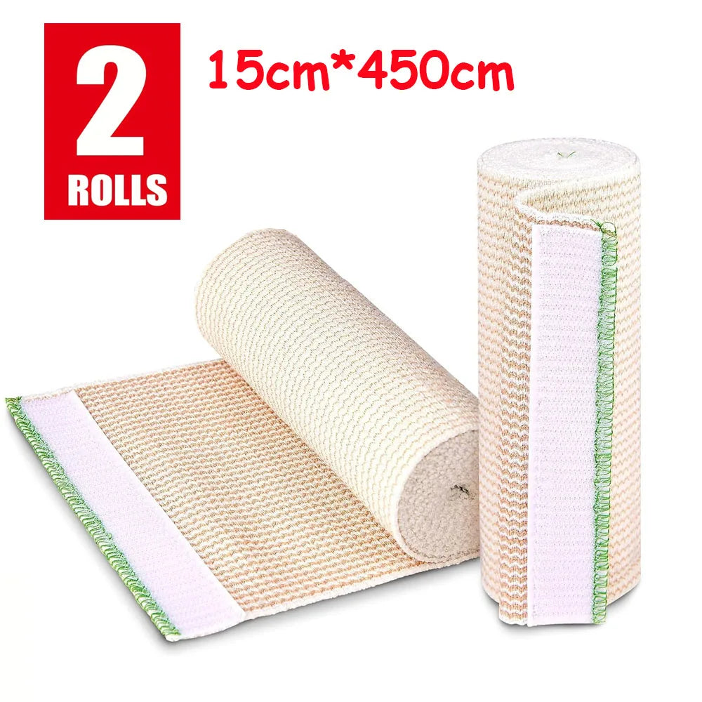 Two rolls of beige and pink reusable hook and loop elastic compression wraps.