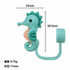 A light blue silicone straw cover shaped like a dinosaur, shown with dimensions and weight.
