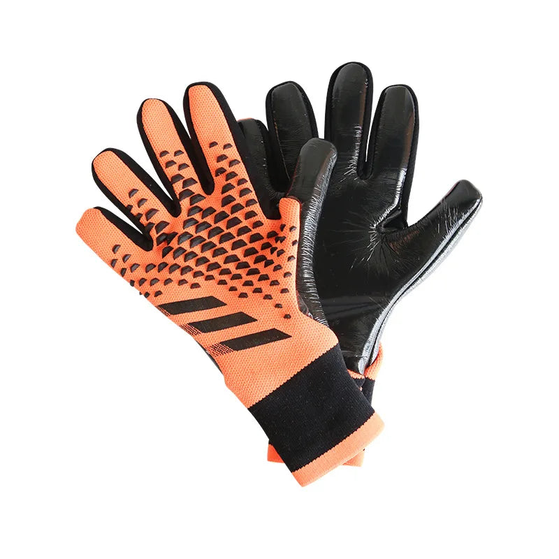 Orange and black goalkeeper gloves with a textured pattern