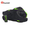 Black motorcycle riding gloves with neon green accents shown from the top view.