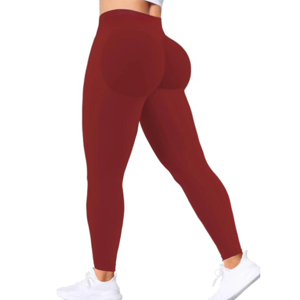 Un modèle porte un legging de yoga sans couture marron foncé à taille haute.