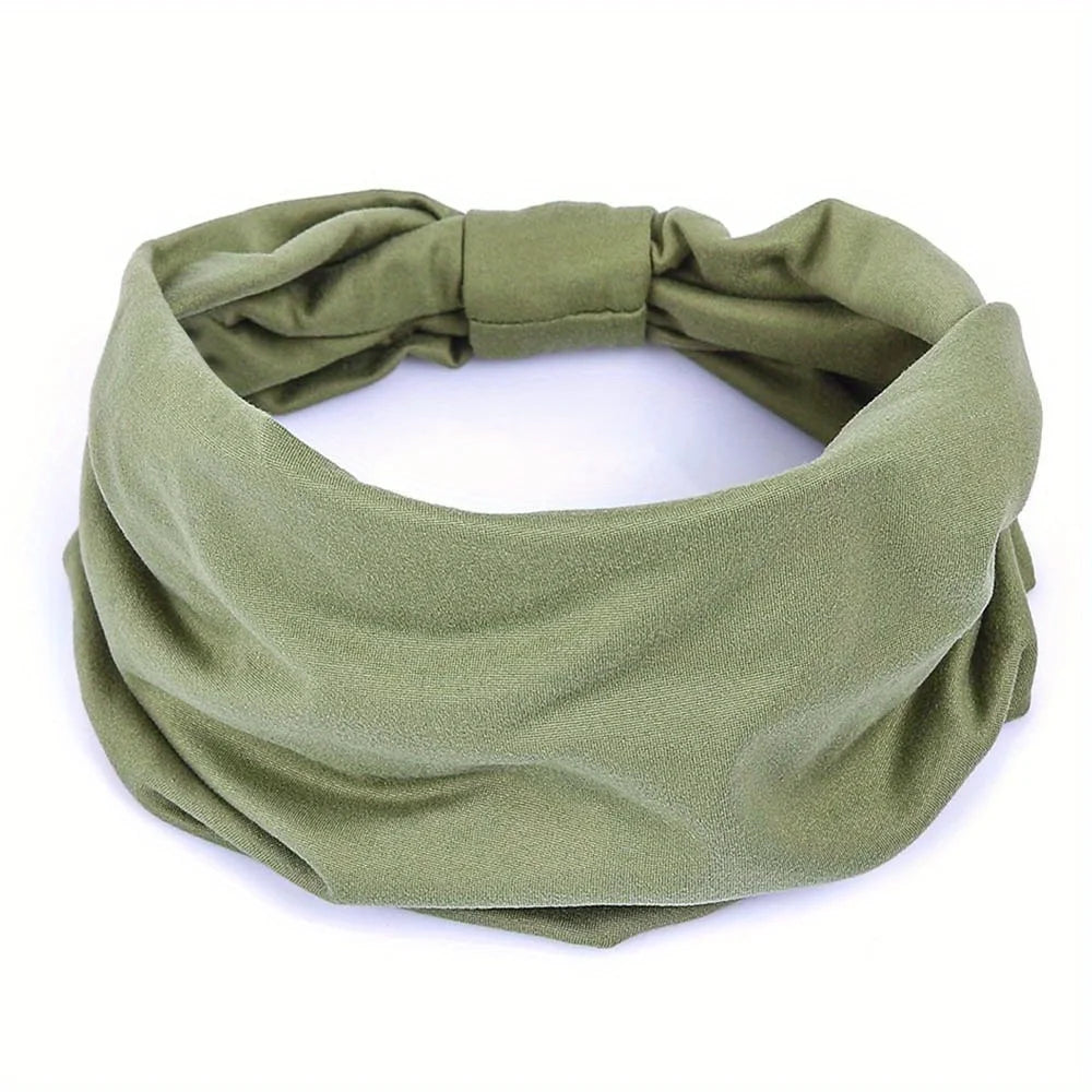 A soft olive green fabric headband tied in a bow, suitable for fitness or hair