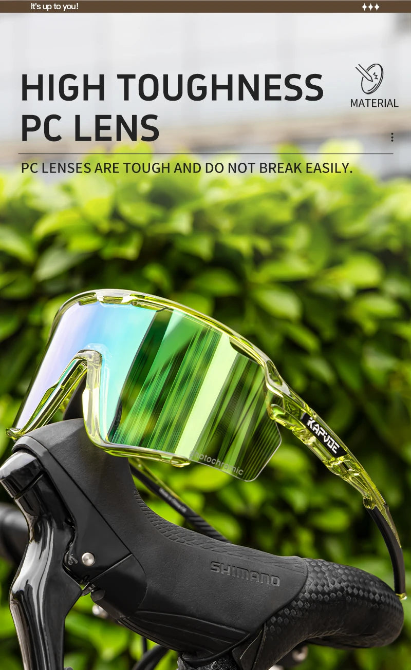 A pair of high toughness PC lens photochromic cycling sunglasses mounted on a bicycle frame.