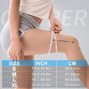A person is demonstrating the fit of a copper ion knee support sleeve on their leg.