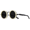 Une paire de lunettes de soleil noires avec des montures dorées et des verres réglables.