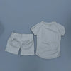 Ensemble de yoga et sport blanc sans couture pour femmes, comprenant un haut court et un short taille haute.