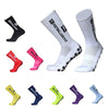 A collection of anti-slip silicone grip football socks in various colors and styles.