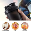 A hand holds a black portable protein shaker bottle next to images of protein powder, tea, and fruit juice.