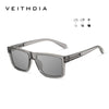 A pair of matte gray, classic square polarized sunglasses with a silver frame and UV400 protection indicators.