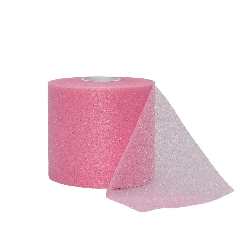 Pink foam athletic tape wrap roll and a piece of the material