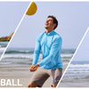 Two men playing beach volleyball in the ocean with a yellow ball under a bright sky.