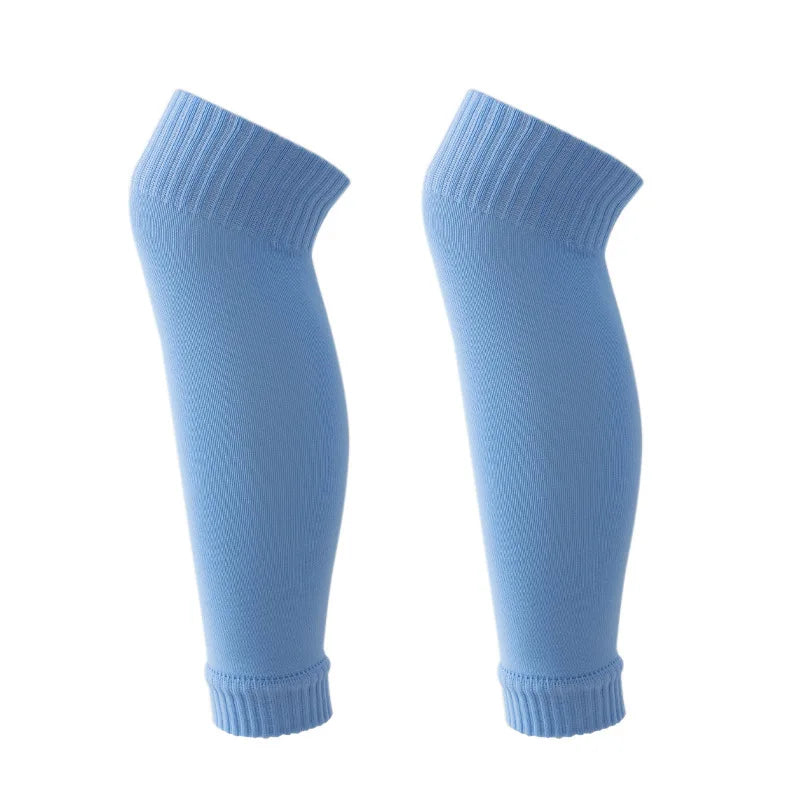 A pair of light blue compression football socks for athletes, shown in a vertical view.